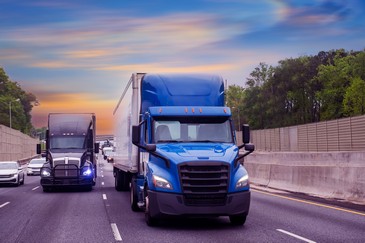 Semi trucks driving